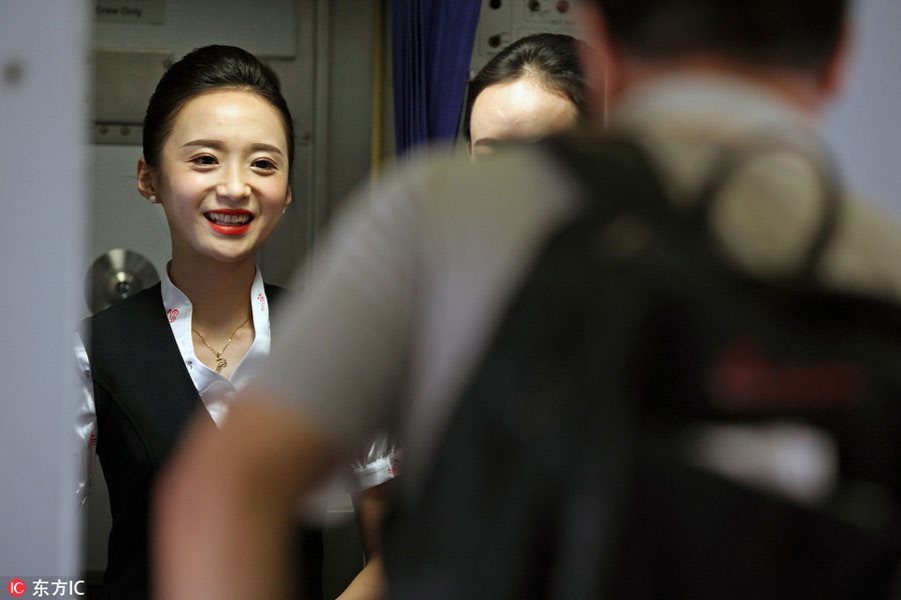 World's most beautiful stewardess: Serving passengers with smile